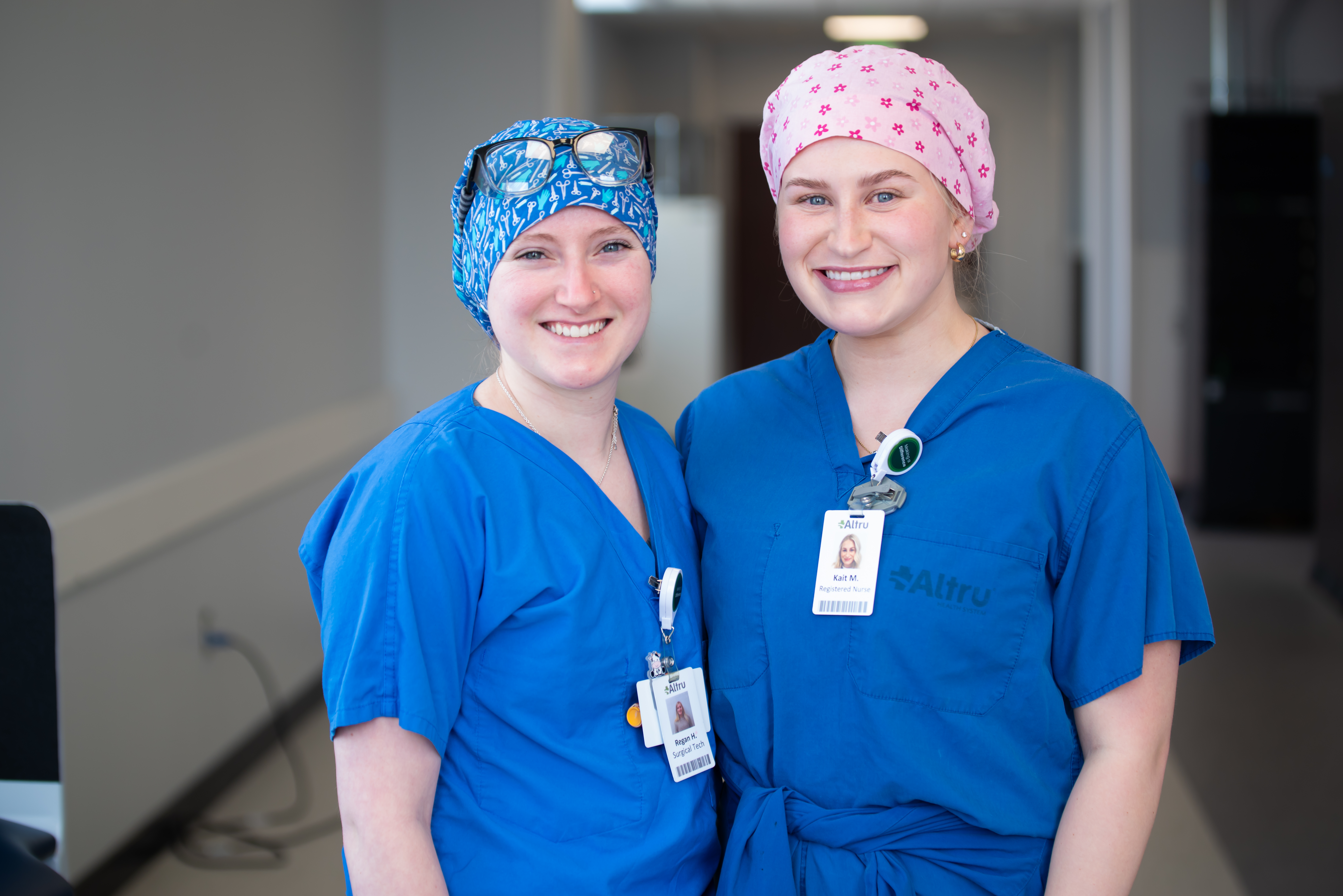 Two female LRSC students in blue scrubs