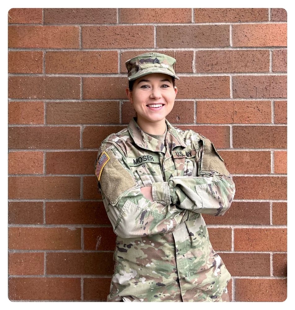 GFAFB Student in uniform with her arms crossed. 