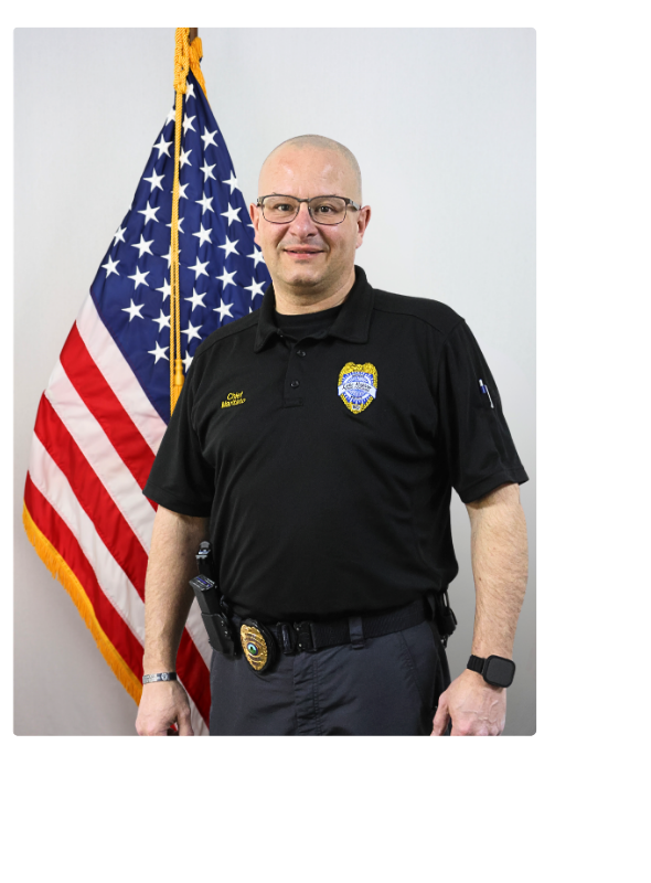 Picture of John Maritato with the US flag. 