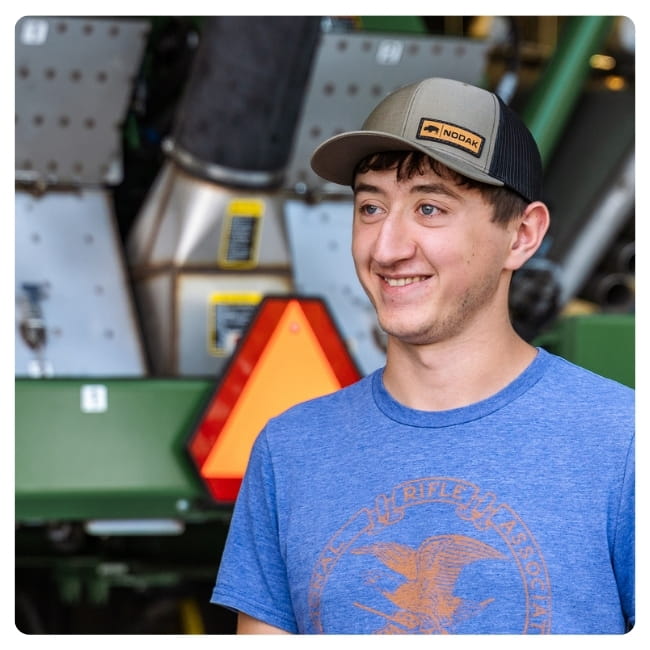 Agriculture student smiling.