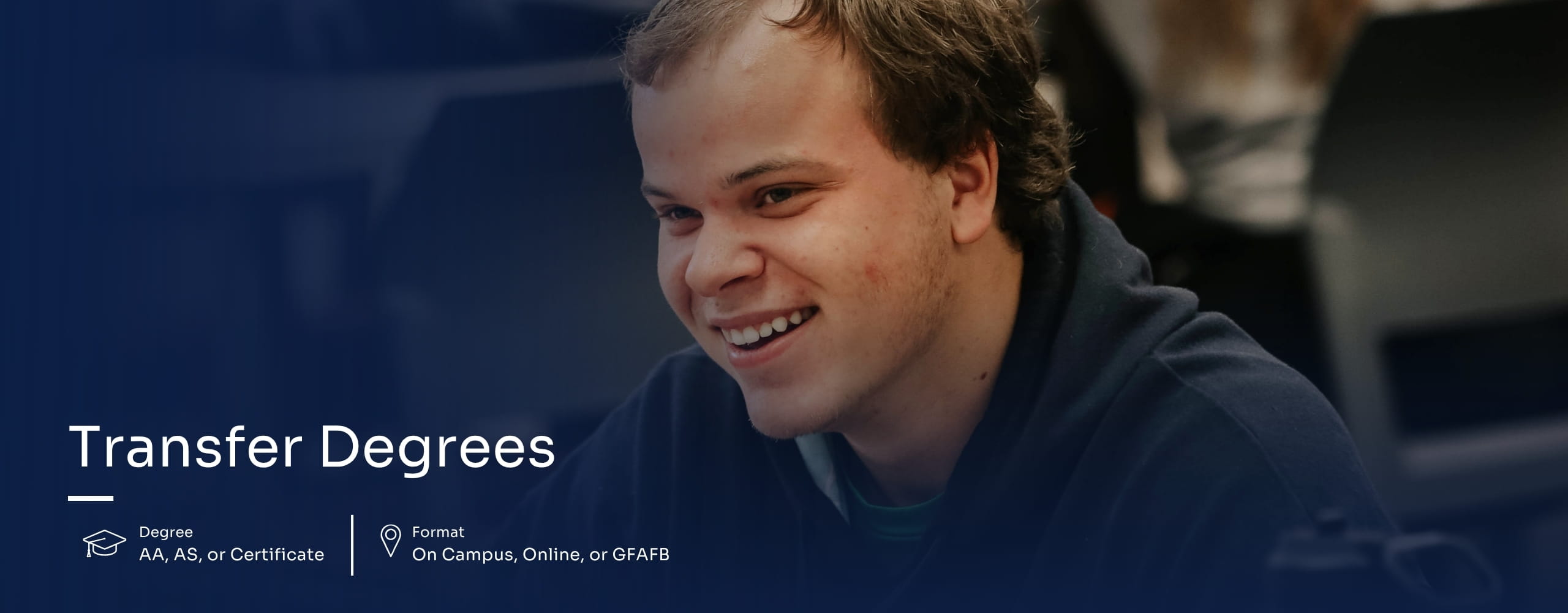 Student smiling during a lecture.