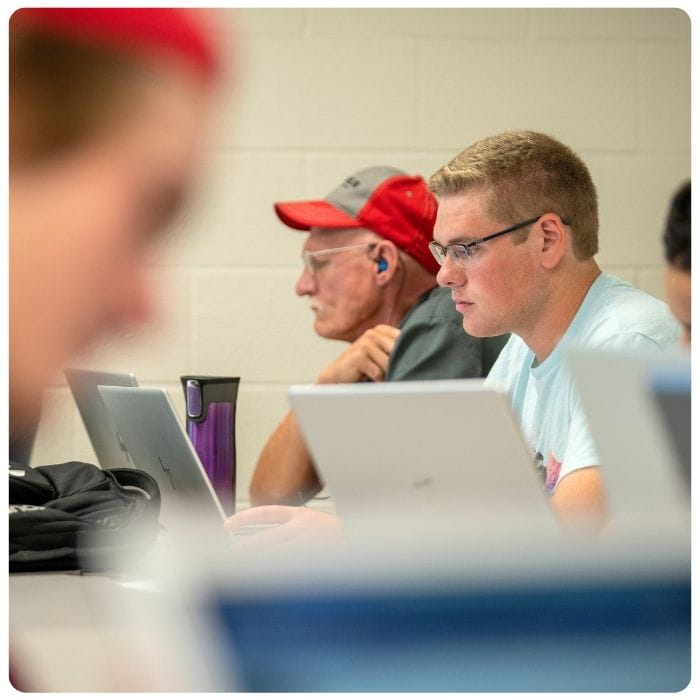Students learning in a classroom.