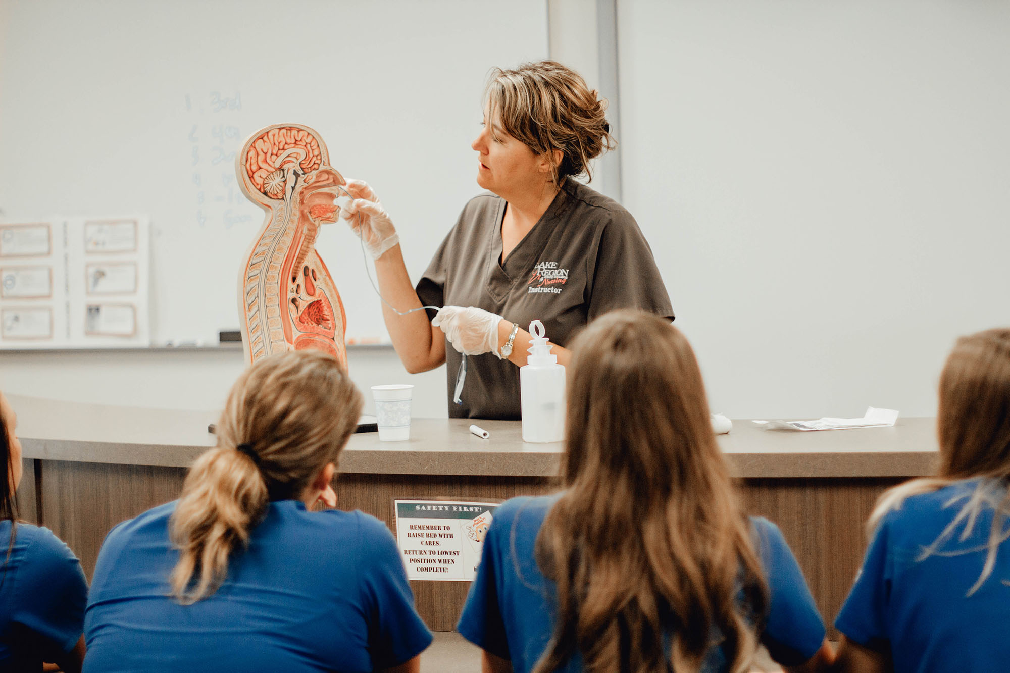 Nursing professor Melissa Moser showcaing upper GI tract to students