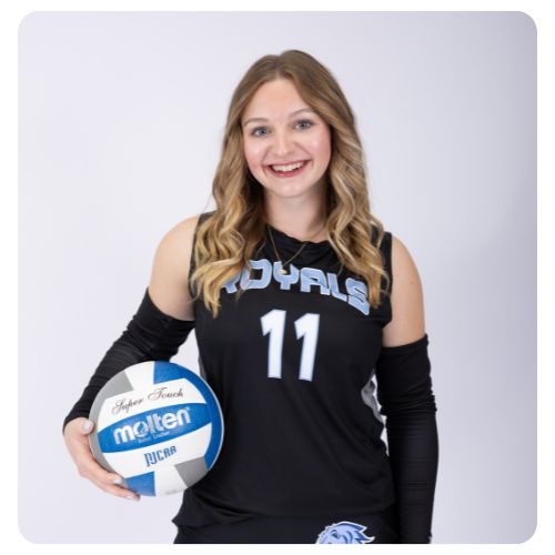 Studio portrait of a Lake Region State College volleyball player wearing a black jersey with the number 11 and holding a Molten volleyball against a light background.