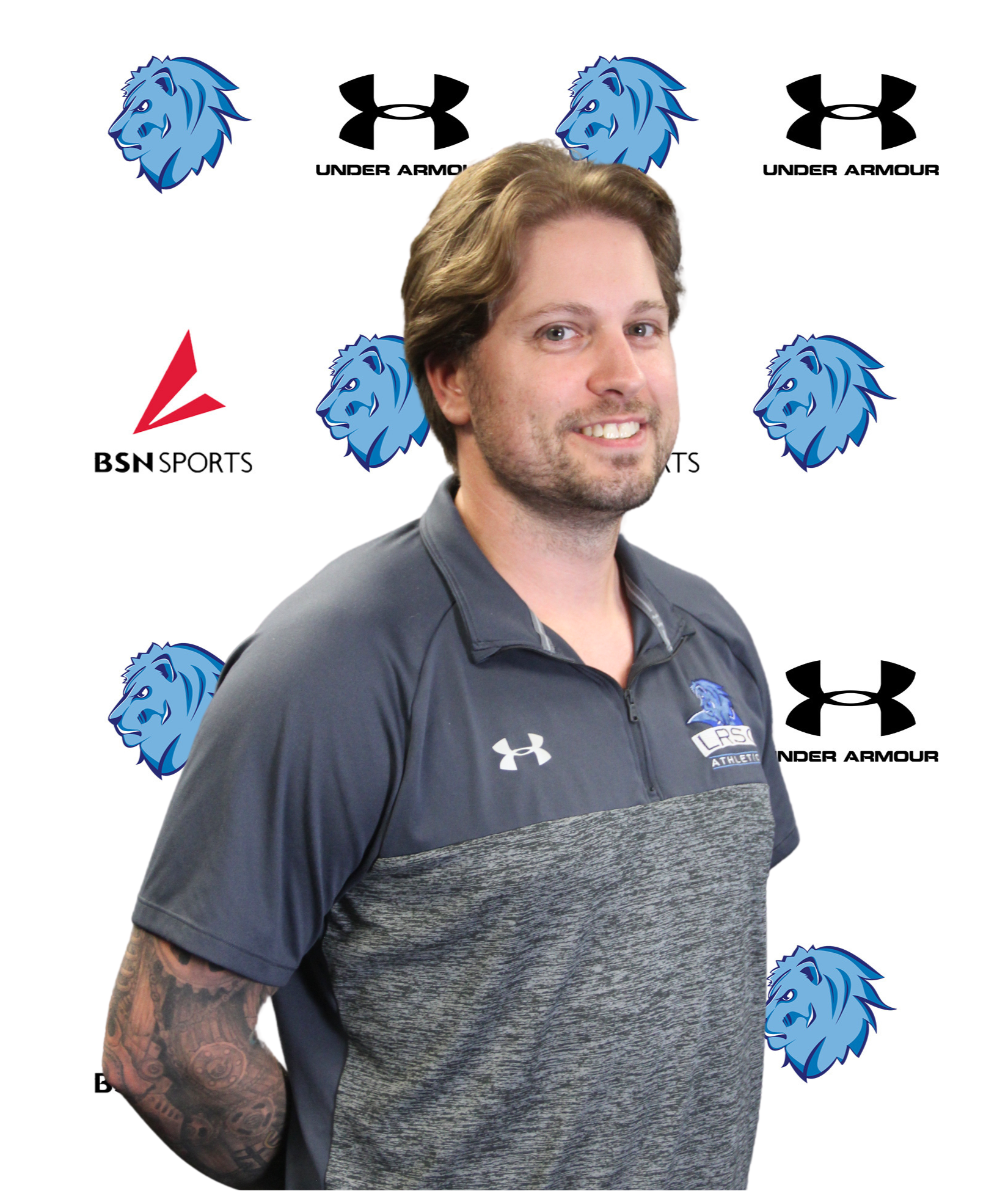 male posed for headshot photo with royals logo