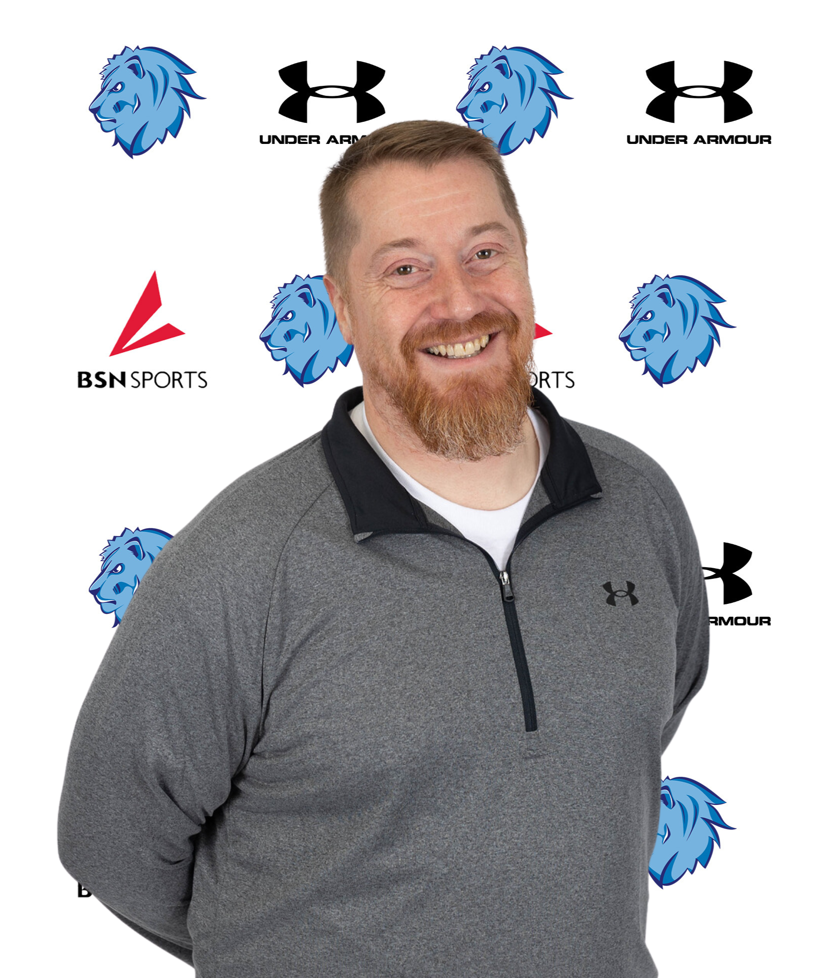 male with red beard and gray shirt, head volleyball coach