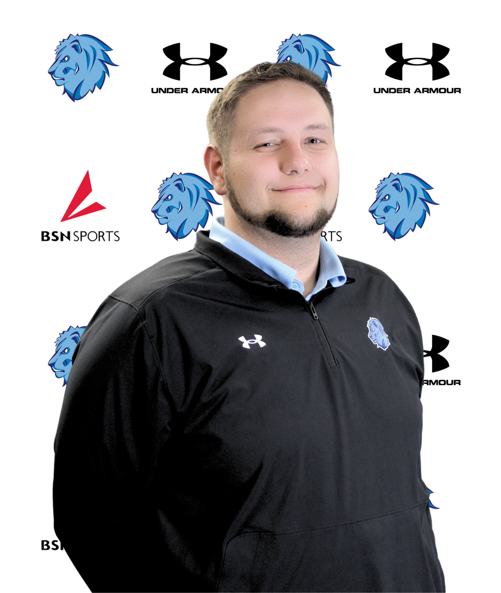 male posed for headshot in front of royals logo