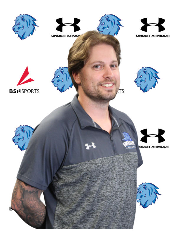 male posed for headshot photo with royals logo.