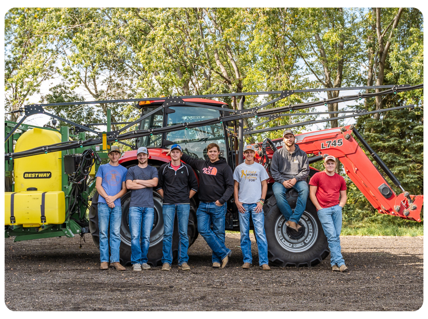 LRSC Ag students standing with equipment. 