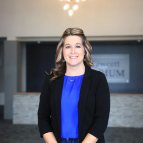 Picture of Kensi Wateland in front of the LRSC entrance. 