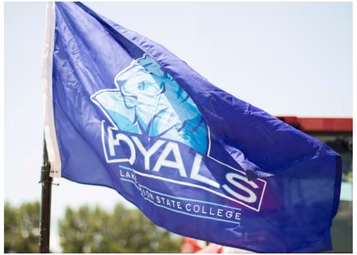Royals Flag blowing in the wind outside. 