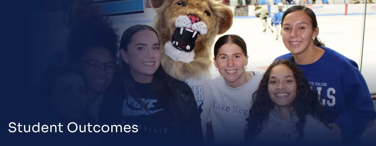 Students gathered with the LRSC mascot at a campus event.
