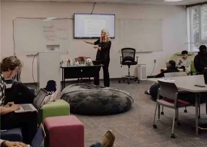 Instructor teaching in a classroom.