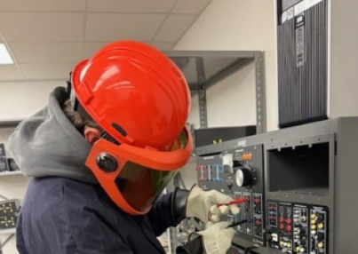 wind energy student works on electrical grid