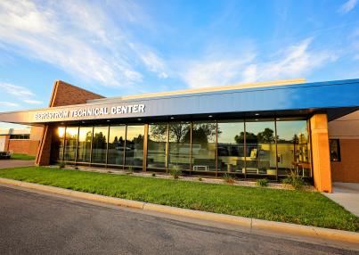 photo of the front of Bergstrom Tech Center on summer day