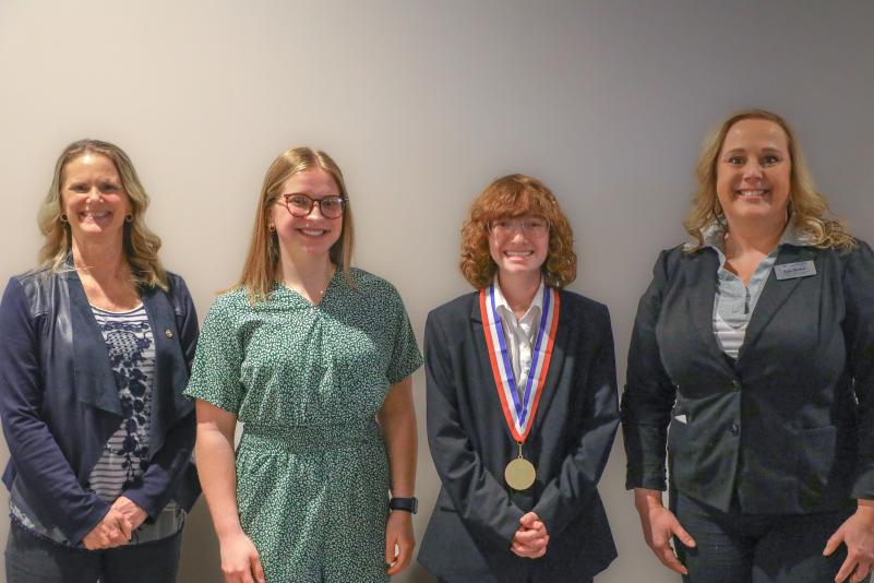 LRSC PTK Advisor Tammy Riggin, Jaelyn Buckman, Gracie Kuglin, and LRSC PTK Advisor Lisa Ginther