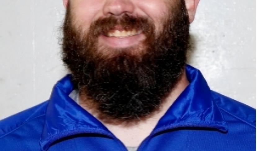 Headshot of Cole Klubek, new women's hockey coach at LRSC